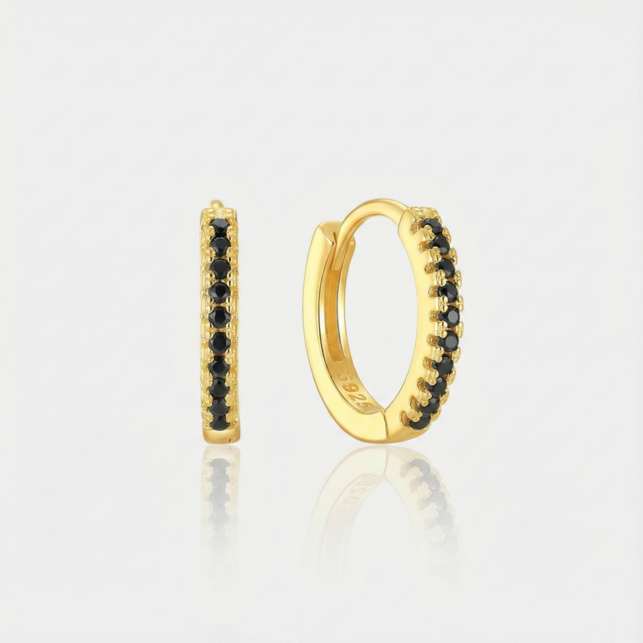 תרזיה – עגילים מוזהבים עם קימור רך